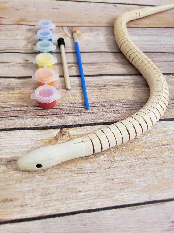 Wooden snake and paint